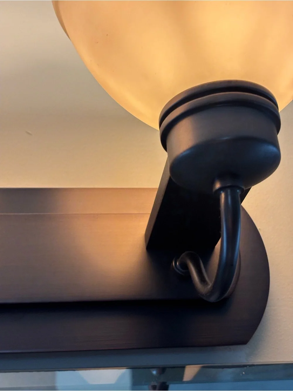 2-Light Bathroom Vanity Wall Light Rubbed Bronze with Beige Glass Shades. (3)